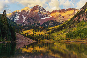 A view of a river and mountain in Colorado